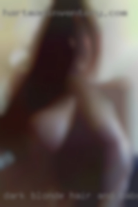 Dark blonde hair and baby horny blue slut eyes.